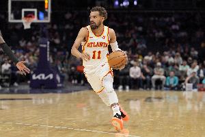 效率不高！特雷-杨14中4拿到12分7板10助2断 正负值-18最低